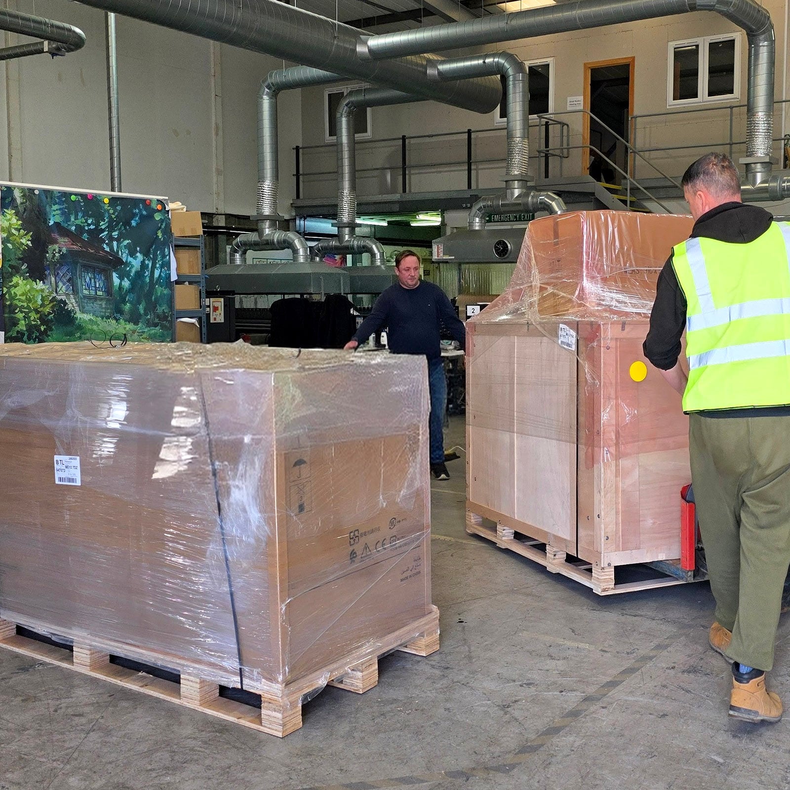 Prinfab co-founder Oliver Mustoe-Playfair overseeing delivery of the DTF production line